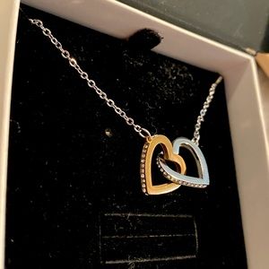 Never worn beautiful gold and silver heart necklace